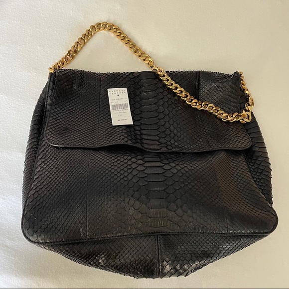 Celine Handbags - SOLD Céline Black Python Leather Gourmette Bag
